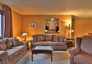 Ski-in/out condo with fireplace, tennis court, mountain views, & washer/dryer