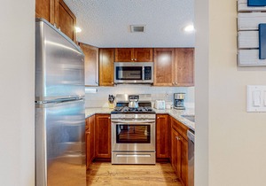 Ski-in/out condo with mountain views, fireplace, pool, & hot tub