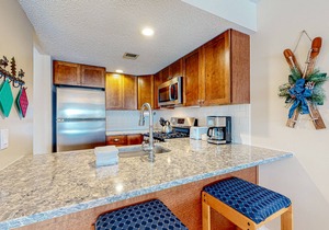 Ski-in/out condo with mountain views, fireplace, pool, & hot tub