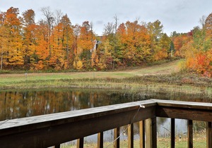 Updated condo with water views, fireplace, ski-in/out, washer/dryer, & tennis