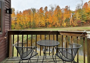 Updated condo with water views, fireplace, ski-in/out, washer/dryer, & tennis