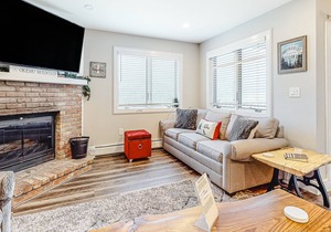 Updated condo with water views, fireplace, ski-in/out, washer/dryer, & tennis