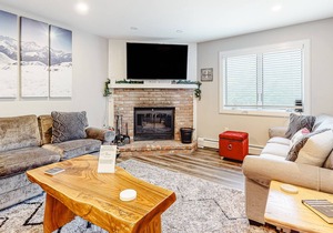 Updated condo with water views, fireplace, ski-in/out, washer/dryer, & tennis