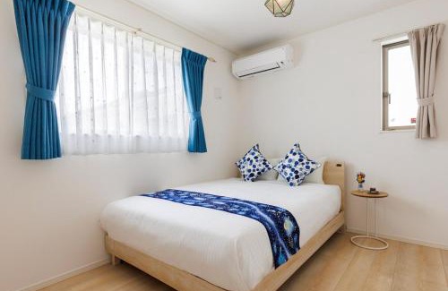 Nagawa Apartment | 那覇空港から15分DMM水族館とイーアス豊崎近く最大10名oKの南部リゾート宿OKS inn