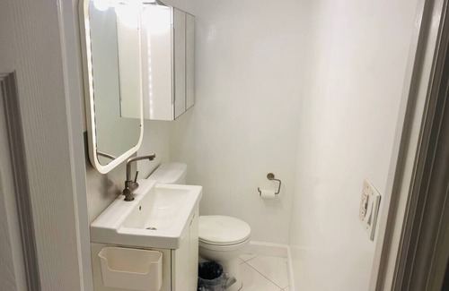 Victoria Park Condo | 1-Bedroom, Private Deck with Shady Mango Tree
