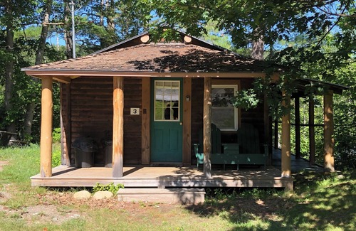 The Forks Cabin | 1 Bedroom Riverside Cabin in The Forks, ME, pet friendly