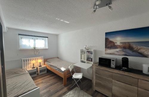 Eichsfelder Kessel Apartment | 1-Raum Ferienwohnung Souterrain Niederorschel