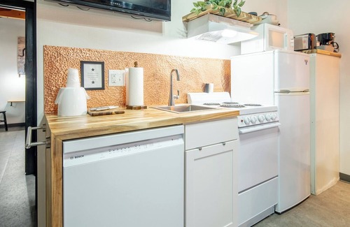 Pinnacles Entrance Badlands Hotel | 19-Hansen Inn & Cabins, Cabin Suite, 1 King, 1 Queen, Sleeper Sofa, Dog Friendly