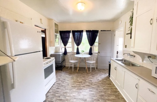 Laramie Apartment | 1920s Home for Extended Stays. Pet-Friendly and Extra Spaces!