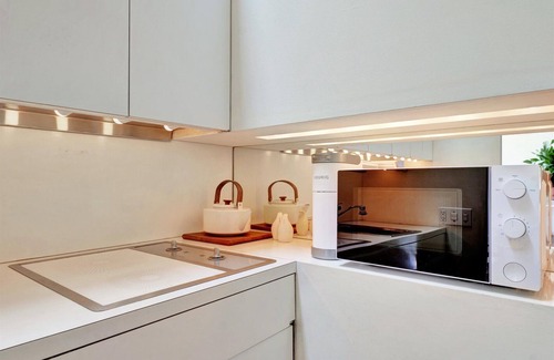 Champaign Apartment | 1960's Mid-Century Modern Apartment w/Original Artwork