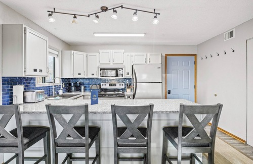 Village of Four Seasons Condo | 1st-floor condo with lake-view deck + on-site pools & hot tub