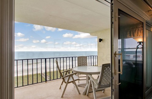 Fernandina Beach Condo | 2 Bed/2 Bath Oceanfront South facing condo sleeps 6. Beachfront balcony & pool.