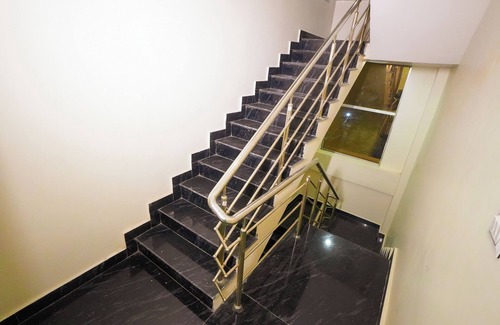 Sigra House | 2 bedroom set with 5 seater sofa in living room, WIFI, AC in Varanasi city.