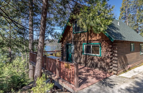 Bass Lake Cabin | 2 BR log cabin with lake view, wrap-around deck, Ping-Pong & wood stove