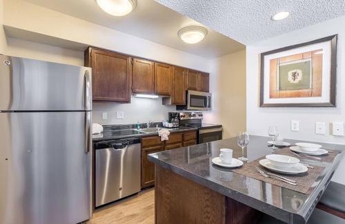 Biggs Field Hotel | 2 Spacious Suites – Pool, Free Breakfast & Full Kitchen