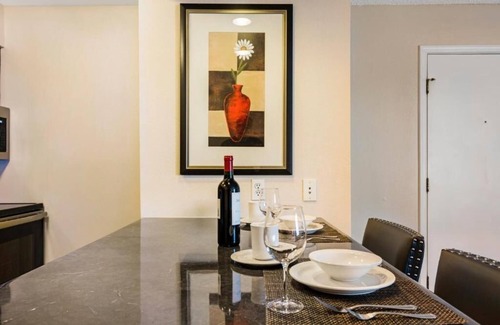 Biggs Field Hotel | 2 Spacious Suites – Pool, Free Breakfast & Full Kitchen