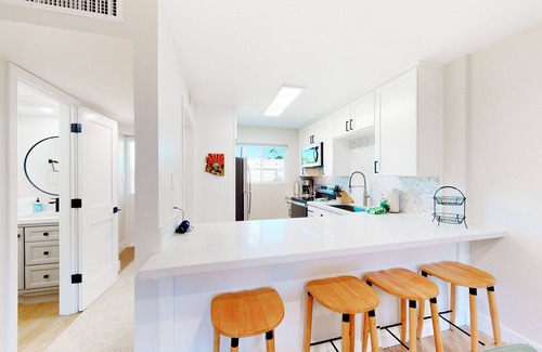 Fashion Square Condo | 2-story dog-friendly condo with patio, outdoor pool, W/D, streaming, partial AC
