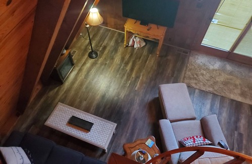 Springville Cabin | 2 wooded acres, 2 king beds & 1 full bed, fire pit & plenty of parking!