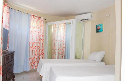 Salt Gut Apartment | 2BR Villa Ocean Views Beach 5mins to Airport