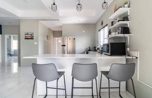 Portmore House | 2nd fL condo unit with gated access in a quiet residential neighborhood.