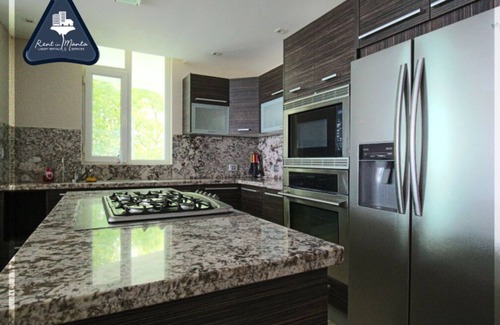 Manta Apartment | 3/3.5 Beachfront Condo in Santorini Building