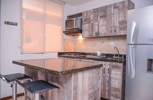 Zona Rosa Apartment | 3 Bedroom AC ALL KING BEDS HOT TUB Enclosed Patio AC 2 blocks Lleras
