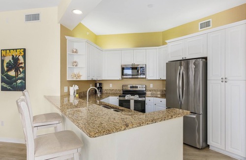 Vanderbilt Beach Condo | 3 Bedroom Condo with Pool and Bay Views-short walk to Beach-WiFi Included