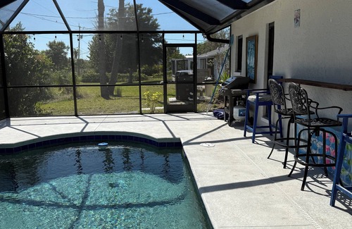 Pine Island Center House | 3-bedroom pool house in charming Bokeelia with AC, WiFi. Beautiful, peaceful,