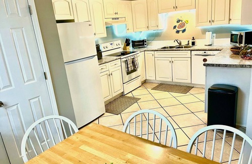 North Carolina Coast Cottage | 30 Sec. to Beach, Sun, Sand & Waves & a Family & Pet Friendly Fenced Backyard