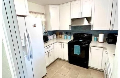 Swan Canyon Apartment | 3BR/3BA Coastal themed Townhome w/Private parking! Centrally located! Patio/BBQ
