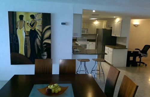 Colonos Cuzamil Condo | 4/4.5 Condo Oceanfront Cozumel Downtown AC WiFi Security