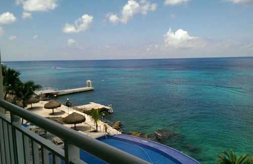 Colonos Cuzamil Condo | 4/4.5 Condo Oceanfront Cozumel Downtown AC WiFi Security