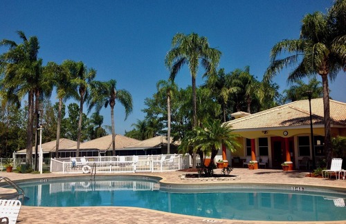 Haines City House | 4 bed/3 bath house with private pool overlooking a lake and nature preserve.