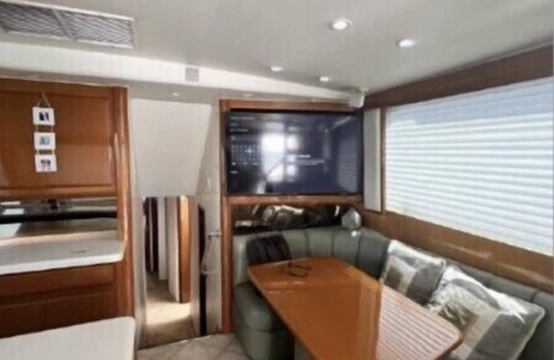 Tampa Boat Rental | 48’ Hattaras Sport Yacht onTreasure Island inter coastal near johns pass village