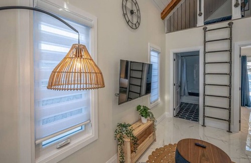 Rosemount House | 48H-3 · Kingsdale Designer Tiny House with Tesla Charger