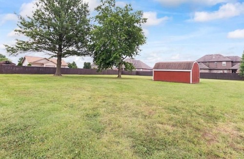 Rogers House | 4BR/3BA Rogers Home -3 mi to AMP