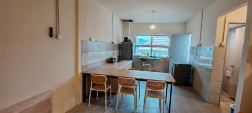 Kuching House | 5 Loaves & 2 Fishes Roomstay Opposite GH