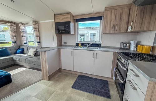 Louth House | 6 berth caravan with decking at Sunnydale Holiday Park ref 35243KG