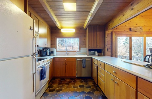 Snowmass Village House | 70's style home near Village with private hot tub & fireplace - dog-friendly
