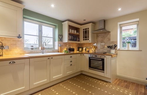 Docking House | A beautifully presented modern cottage-style detached house, situated in a quiet position well away
