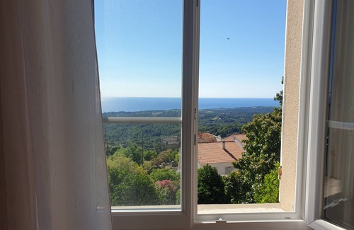 Valle-de-Campoloro Bed & Breakfast | A Caserella - Chambre d'hôte avec salle de bain non attenante et vue sur mer