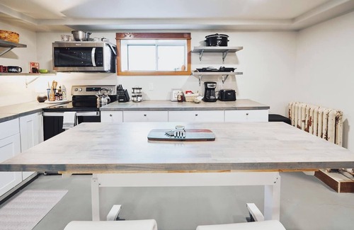 Sheridan Apartment | A comfortable two-bedroom, one-bathroom private apartment with two private entries on the LOWER LEVEL of a lovely ranch-style home on the banks of picturesque Little Goose Creek.