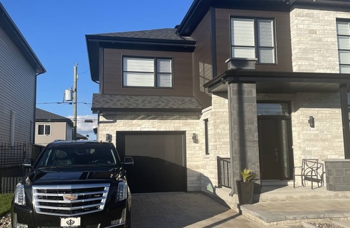 Vaudreuil House | A cozy cool basement for guest