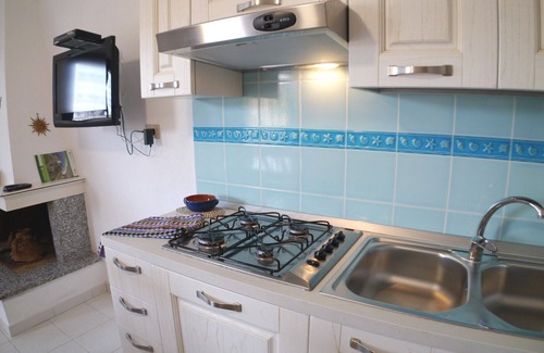 Chia Apartment | A few meters from Su Giudeu. Sleeps 6. Discount on ship tickets. Ground floor.