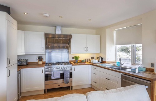Brixham House | A few minutes’ walk from the harbour, with sea views and 7 bedrooms