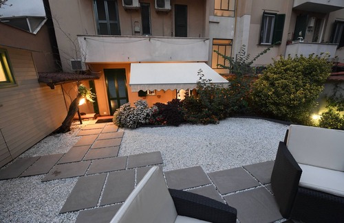 San Giovanni Apartment | a house with many outdoor spaces in the center of rome.