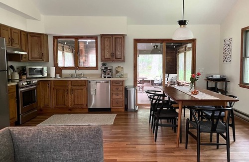 Yulan Cabin | A peaceful, quaint cabin in the woods offers a country-side escape for couples, small families, and friends.