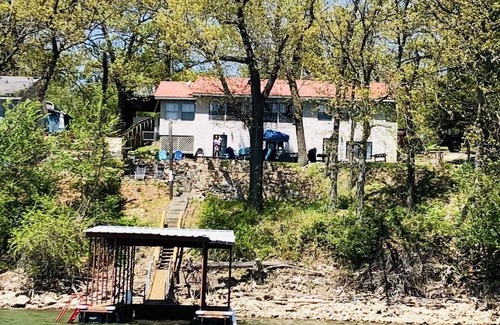 Grove House | A serene waterfront view with private dock. Spend quality family time and relax.