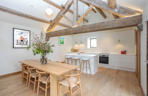 Skipton House | A stunning barn conversion sleeping 7 guests with hot tub located at an award winning wellbeing resort
