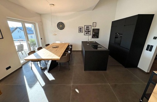 Auenstein Apartment | Abstatt Deluxe Loft with spa bath, designer kitchen, balcony, elevator & private parking space